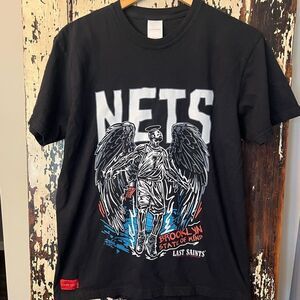 G’ Juan Xavier Brooklyn Nets Last Saints basketball T-shirt. Size Medium